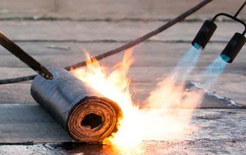 Sand asphalt flat roofing repairs